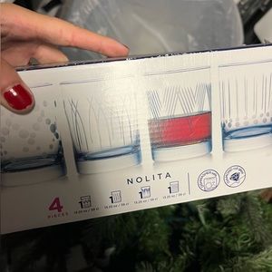 Brand new set of 4 glasses
